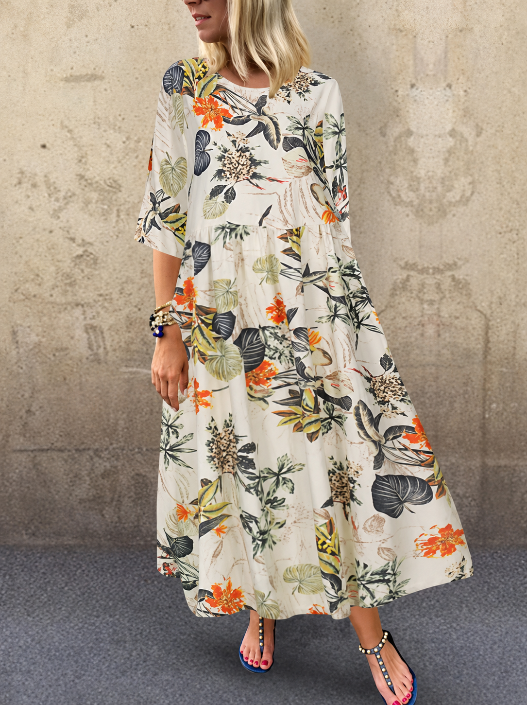 Elegantes Sommerkleid mit Blumendruck und Dreiviertelärmeln
