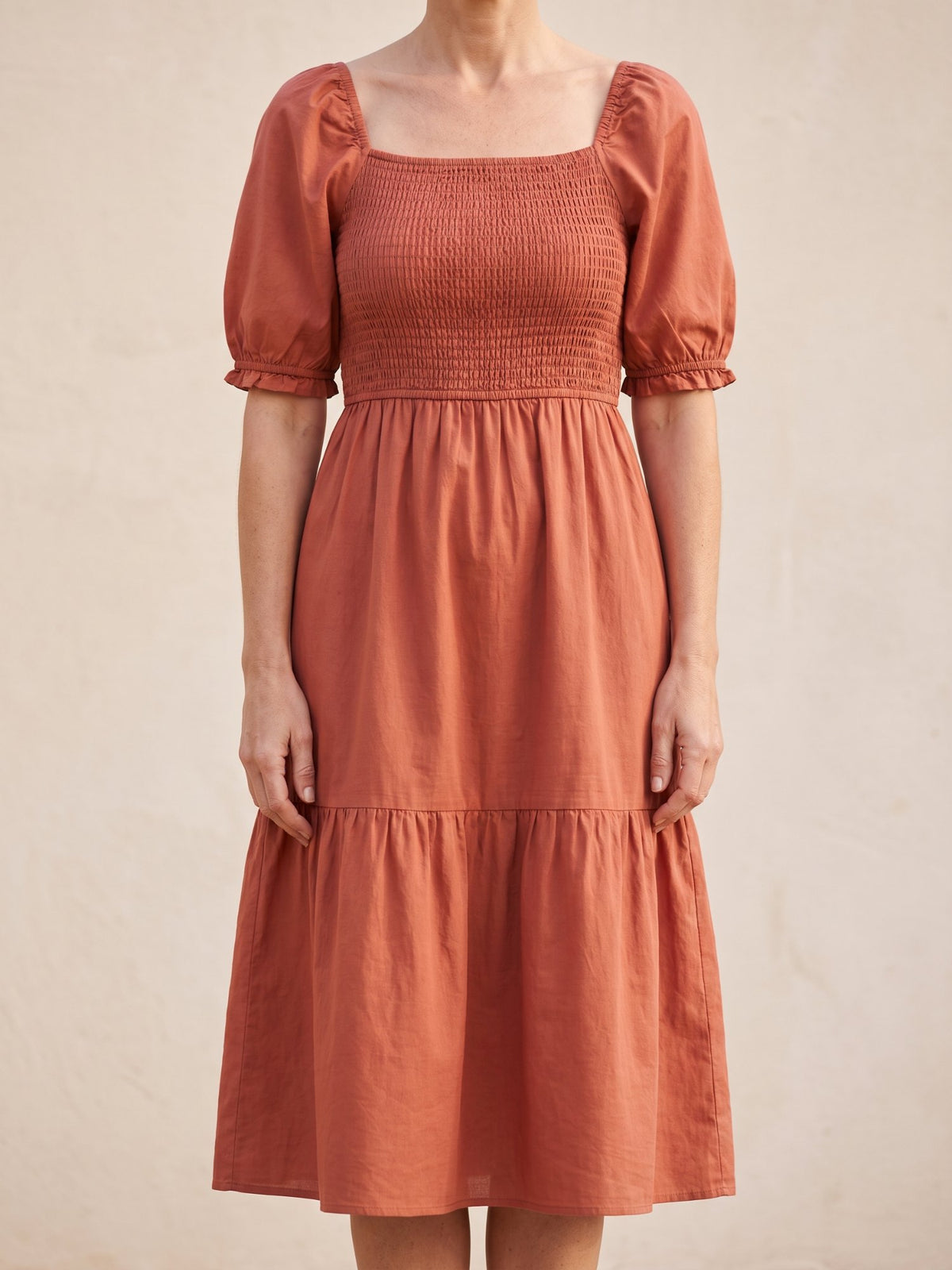 Women's Puff Sleeve Smocked Midi Dress in Terracotta, front view